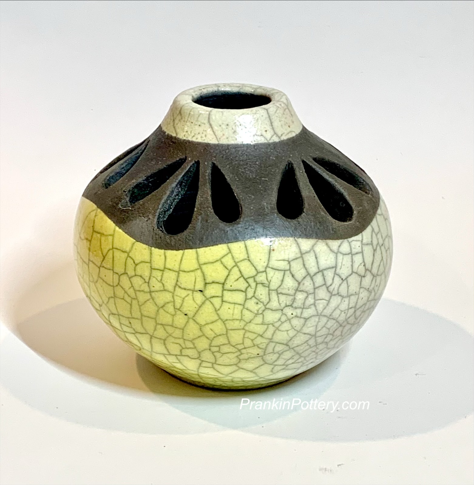 Raku carved with yellow crackle glaze